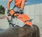 Orange, black and gray STIHL Cut-Off Saw, 16 ft., Gas Powered