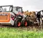 Orange and white Bobcat skid steer
